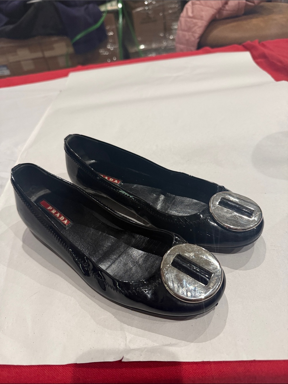 Prada Black Patent Leather Flats with Silver Round Buckle
